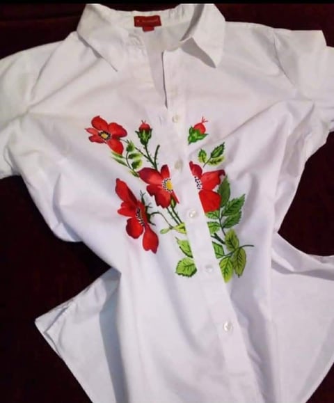 White button-up shirt with red and pink embroidered floral design on the front